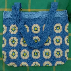 Selling of crocheted multicoloured granny square tote bag
